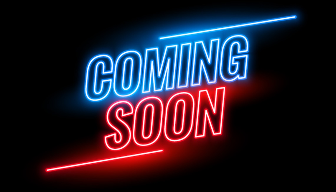 coming soon text in blue and red neon colours on black background