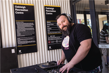 DJ playing live music at Oakleigh Recreation Centre Entrance