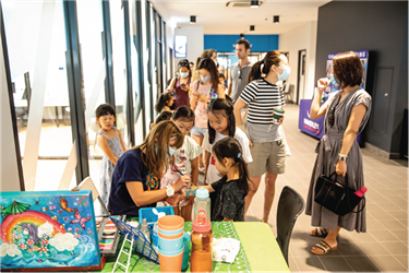Child receiving face painting at Oakleigh Recreation Centre