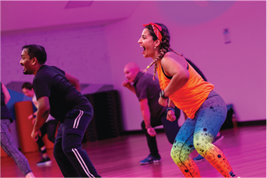 Participants and Instructor at Zumba class