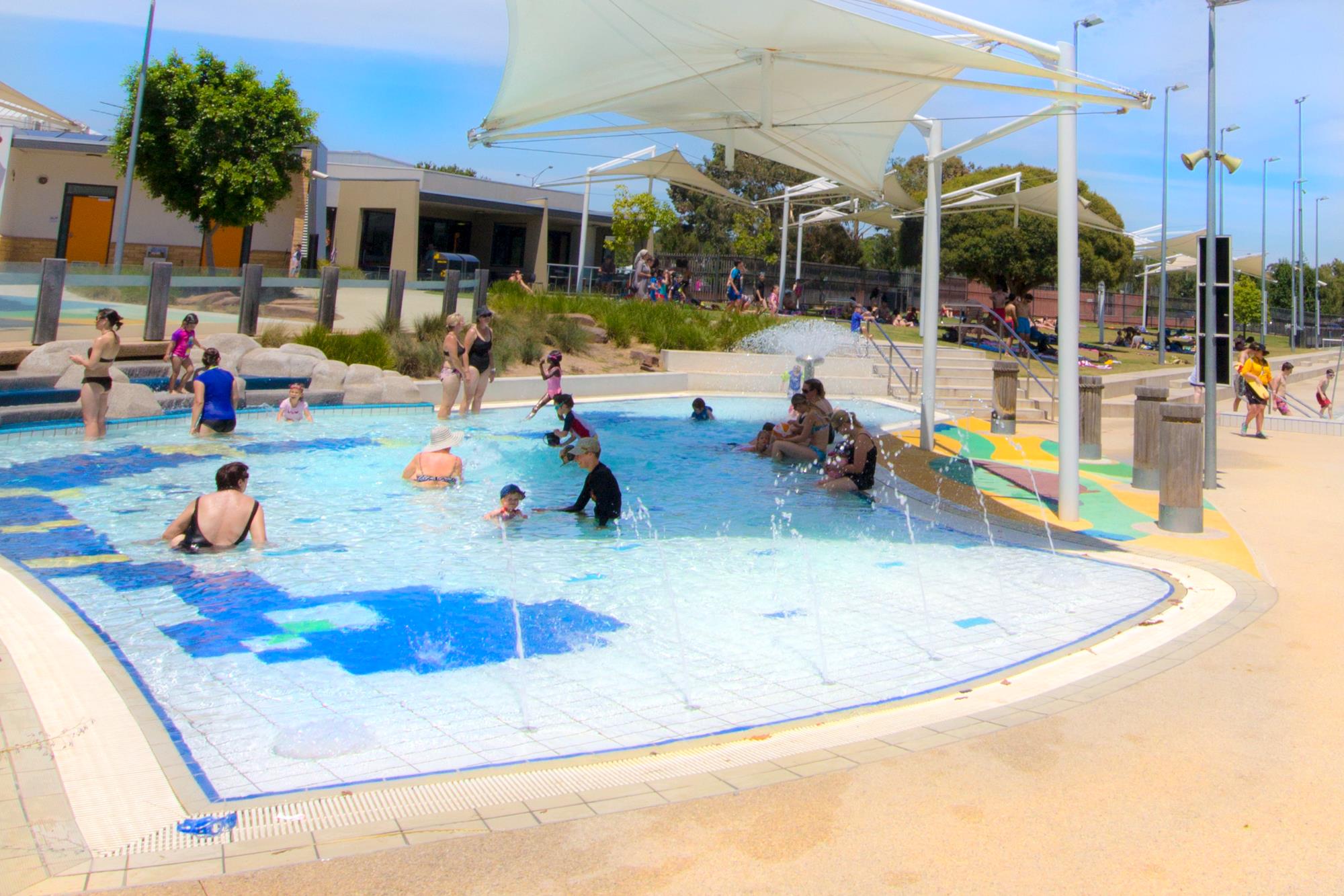 People playing in the toddlers pool