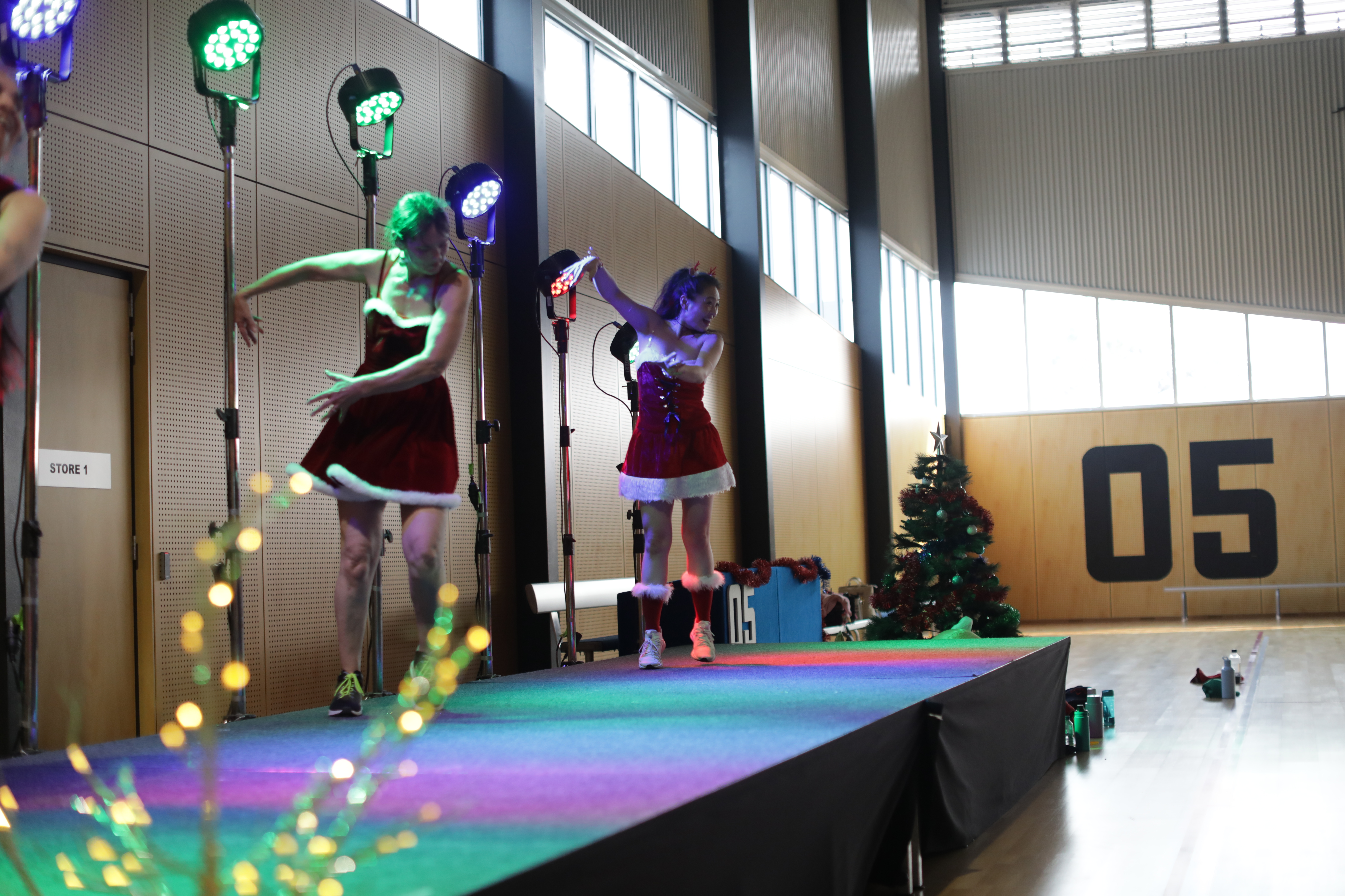 Zumba Instructors dancing on stage.JPG