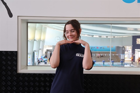 Staff member posing in front of camera.JPG